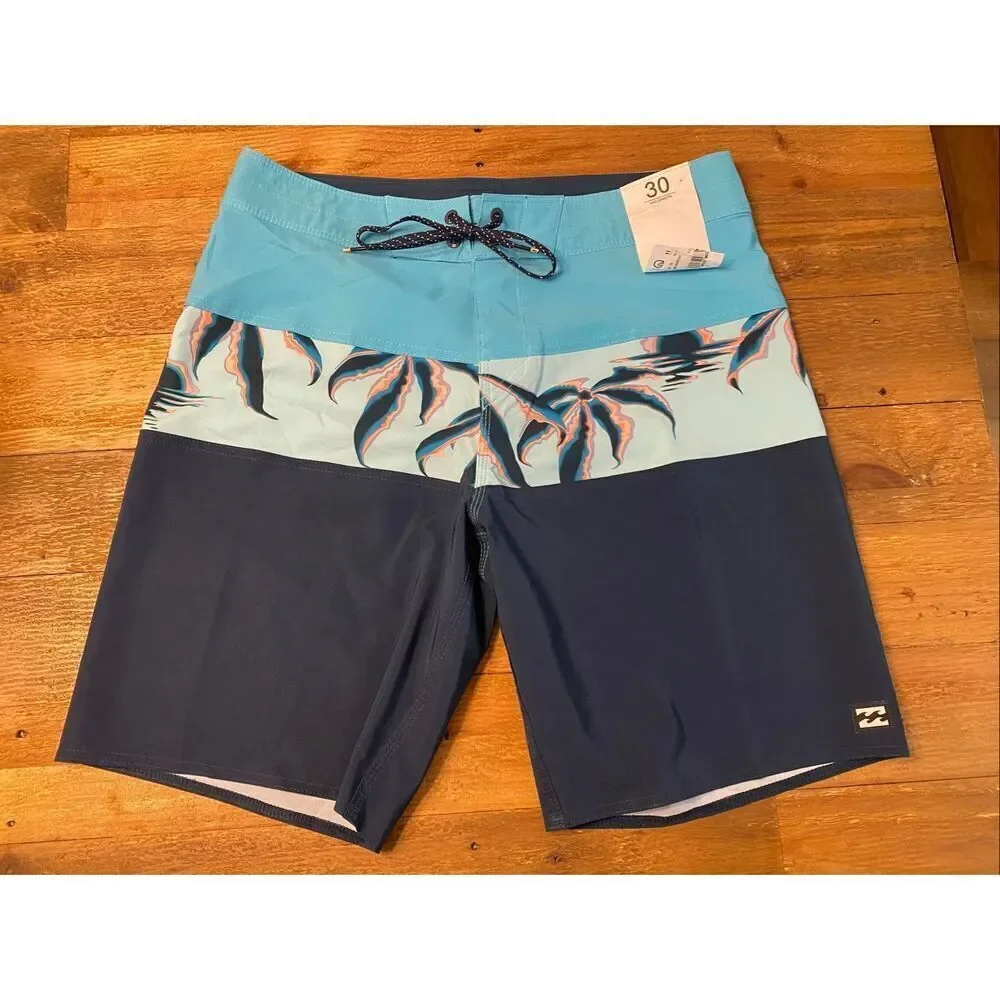 Billabong size 30 NWT Tribong Pro Boardshorts mid length blue swimwear shorts